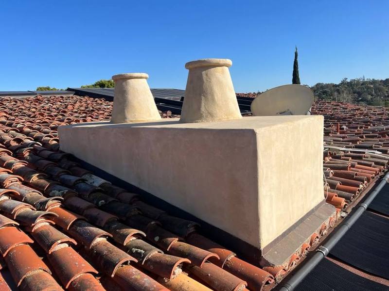 The same stucco chimney after cleaning