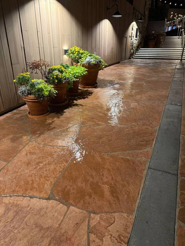 Flagstone walkway being washed