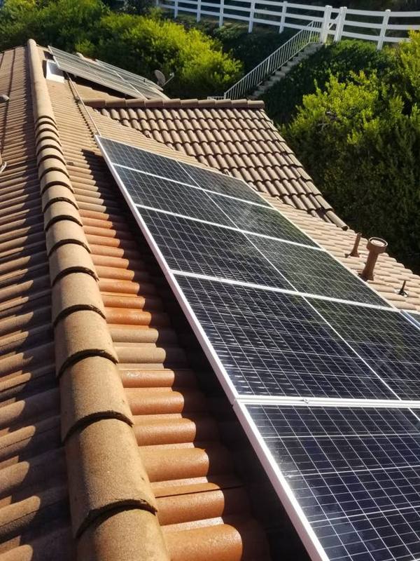 Solar array on a clay tile roof