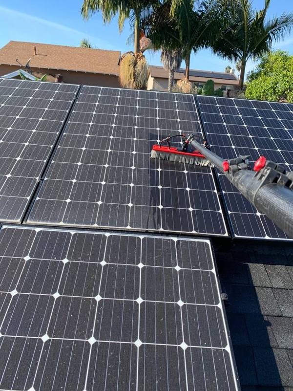 Soft brush cleaning solar panels