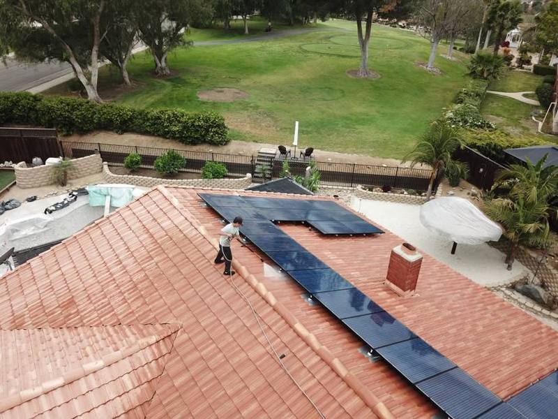 Cleaning an L-shaped solar array